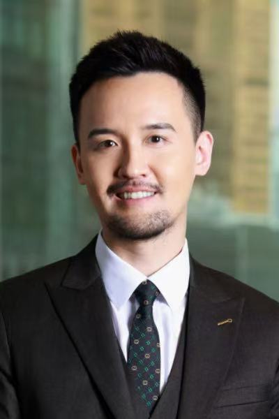 彭博行业研究亚洲首席外汇及利率策略师赵志轩（受访者提供）