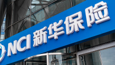 新华保险:董事长万峰辞职 董事黎宗剑代行董事